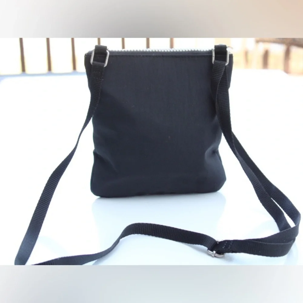 Baggallini triple zip cross body bag